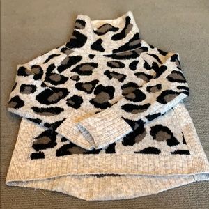 Leopard print turtleneck sweater